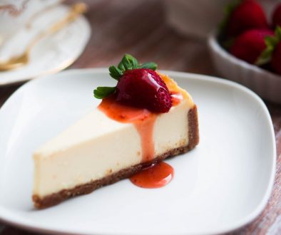 Strawwberry cheesecake on rustic background